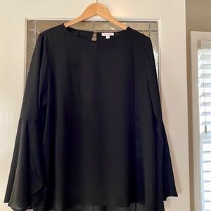 Large sheer black blouse